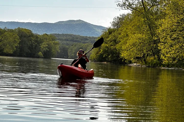 a small boat in a body of water